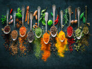 21 spices for wholesome vacation meals – Harvard Well being Weblog Colorful herbs and spices for cooking on dark background