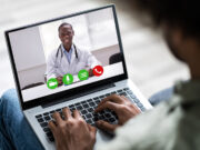 COVID Stressing the Nation’s Stress Remedy System photo of man on video conference with doctor